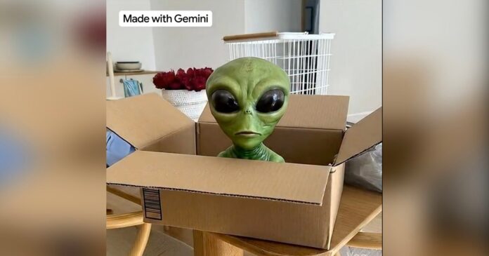 Gemini-AI-Photo-to-Video.jpg A green alien figure with large black eyes sits inside an open cardboard box on a table in a home setting.