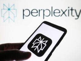 Perplexity AI logo is seen on a smartphone and on a PC screen.