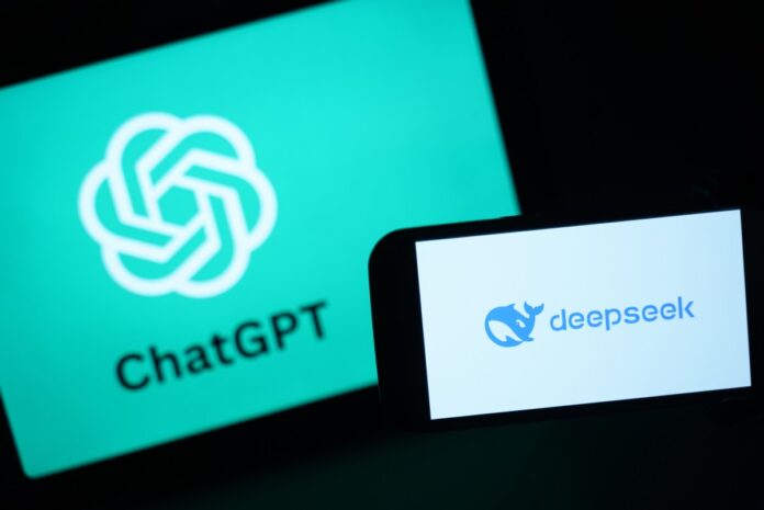 GettyImages-2196335614.jpg In this photo illustration, the DeepSeek logo is seen next to the Chat GPT logo on a phone.