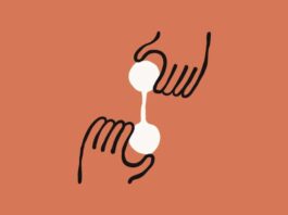 Abstract hands holding white spheres on orange background.