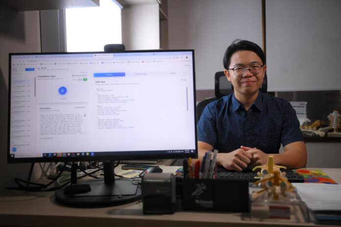 18-year-old John Tow, a second-year Anglo-Chinese School (Independent) student that has coded SGscribe, an AI-powered medical transcription device that converts recordings of doctor's consultations to SOAP notes, pictured with an example of the landing page on July 7, 2025.
