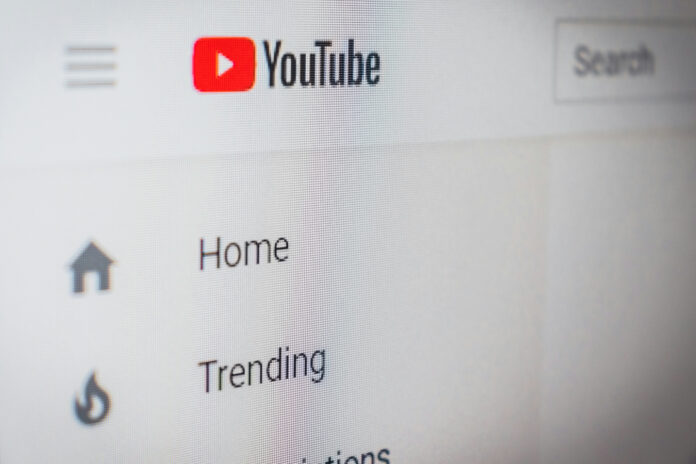 christian-wiediger-NmGzVG5Wsg8-unsplash-1.jpg Close up of Youtube homepage.