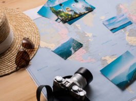 A map with camera and photos for travel vacation.