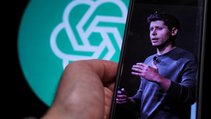 sp5sXZYvZg86uX7YyzWzX8.jpg Sam Altman and ChatGPT logo.