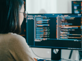 Group Asia Male, Female Freelance Typing Write Prompt Ai Bot It App Smart Program Nomad, Video Game, Terminal With Coding Language, User Interface, Designer, Big Data Center On Desktop Computer.