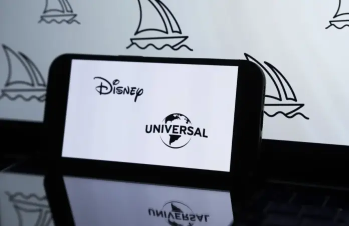 Photo illustration of Disney &amp; Universal logos (Image via Getty)
