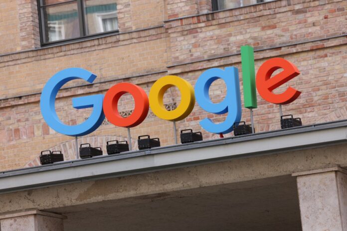 GettyImages-1337403704.jpg Google corporate logo hangs outside the Google Germany offices