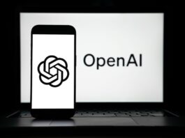 the logos of Open AI displayed on both computer and smart phone screen