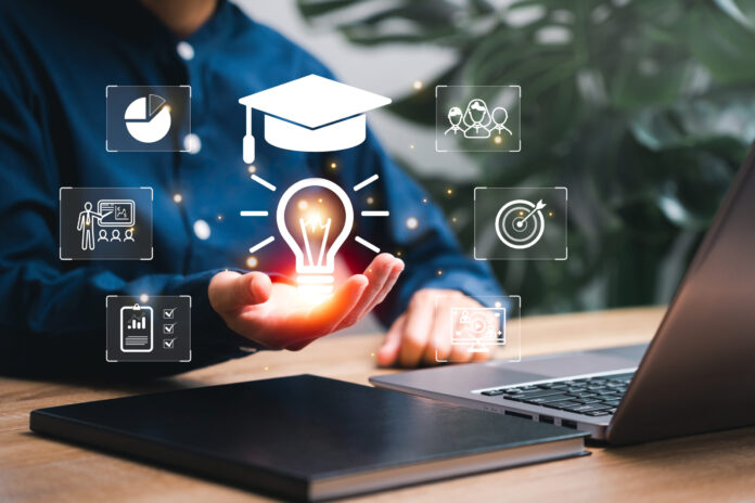 iStock-1605523233-scaled.jpg Education, E-learning graduate certificate and business concept, Women showing light bulb with graduation hat in hand Education technology study knowledge, creative thinking idea human development