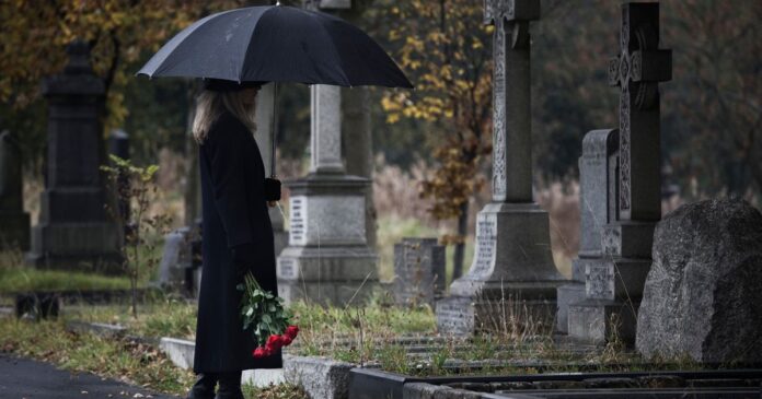 1_widow-bringing-roses-to-a-grave-in-a-cemetery.jpg Ipso logo
