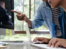 Programmers and developer teams are coding and developing software