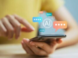 Hand using smartphone and chatting with chatbot application, shows message speech bubbles digital screen of social media notifications. Ai (Artificial Intelligence) technology concept.