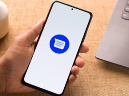 A phone displaying the Google Messages logo