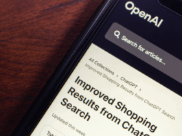 A smartphone screen displays OpenAI’s ChatGPT interface with an article titled “Improved Shopping Results from ChatGPT Search.”