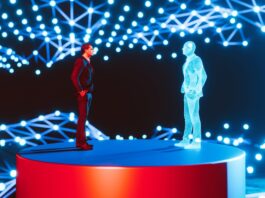 Man standing on a red platform, facing a holographic digital twin of himself. The background features a network of interconnected blue lights, creating a futuristic and high-tech atmosphere. The scene represents concepts of digital twins, virtual reality, and advanced technology.