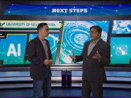 John Licato and Sudeep Sarkar from USF stand in a studio