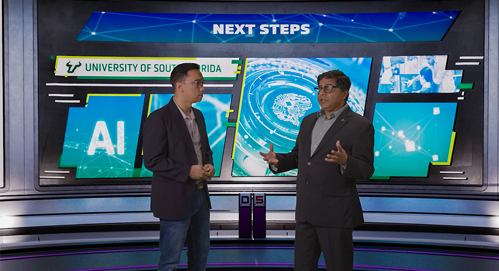 article-2.jpg John Licato and Sudeep Sarkar from USF stand in a studio