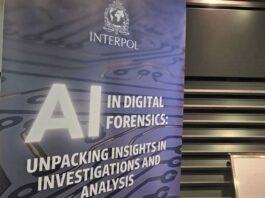 HTX Demonstrates Advanced Deepfake Detection Technologies at INTERPOL Conference A close-up of the Interpol banner for the "AI in Digital Forensics" event.