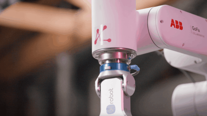 mbodi_logo_on_abb_robot.png Mbod logo on robotic arm