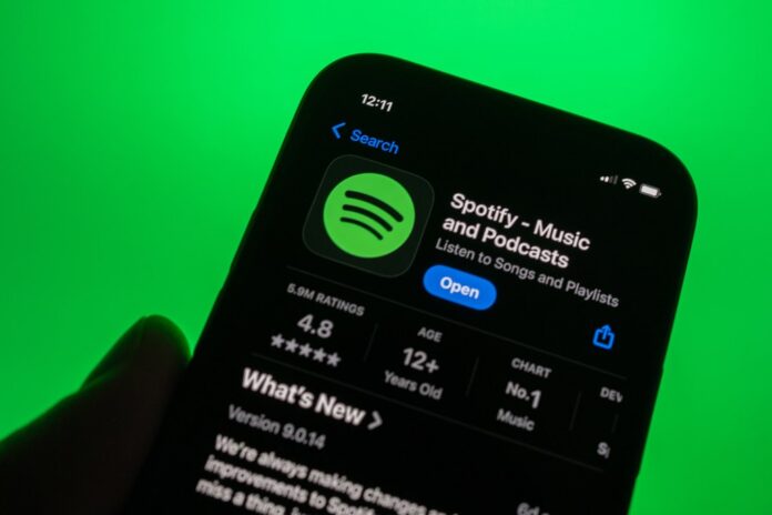 spotify-app-phone-billboard-1800.jpg Artist-First Tools and Industry Partnerships