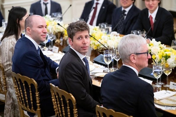2233062251_tech-leaders-including-sam-altman-ceo-of-openai-and-tim-cook-ceo-of-apple-attend-a-dinner.jpeg OpenAI’s partners shouldering $100 billion of debt, taking on all the risk - Sherwood News