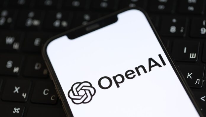 OpenAI logo on a smartphone screen