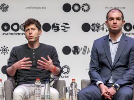 Sam Altman (left) and Ilya Sutskever (Right) sit in chairs on stage at an event.