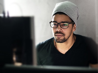 Man-using-Computer-2.jpg Securing Shadow AI with Cortex Xpanse