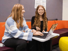 Two women smiling during a Writing Lab appointment