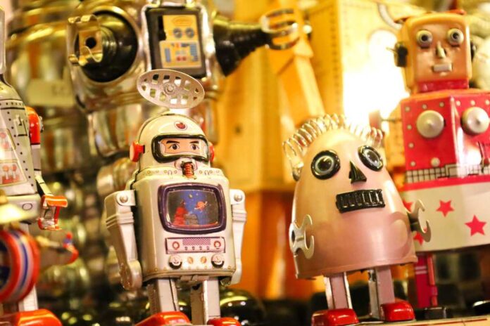Madrid, Spain- April 7, 2024: Vintage toy robots for sale in a showcase