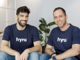 Hyro co-founders Rom Cohen and Israel Kush sitting together