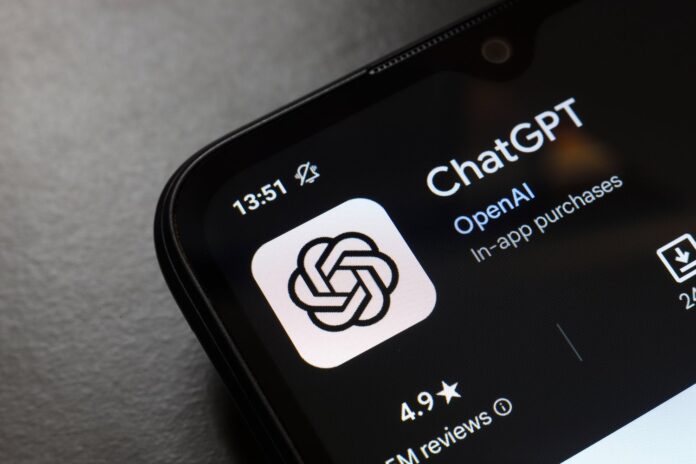 The ChatGPT app logo displayed on the screen of a smartphone