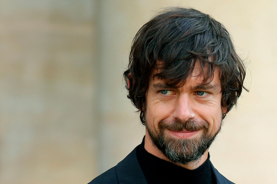 1772170826_S1200x630-FPNG.png A man with tousled dark hair and a beard smiles slightly while looking to the side, wearing a black turtleneck and jacket.
