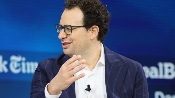 Dario Amodei, CEO and co-founder of Anthropic speaks onstage. Amodei was among those who left OpenAI in 2021 to found a "safer alternative."