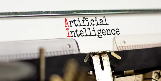 Typewriter with paper reading "Artificial Intelligence;" An Overview of the Privacy Risks Surrounding AI Notetaking Tools