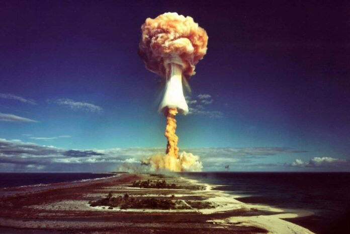 A mushroom cloud after the explosion of a French atomic bomb above the atoll of Mururoa, also known as Aopuni