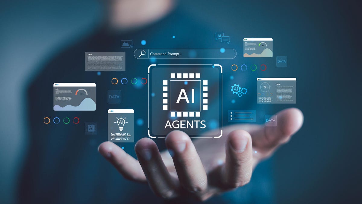gettyimages-2229177564.jpg Decorative graphic of a hand holding AI agents virtual interface with data analytics, automation and machine learning icons.