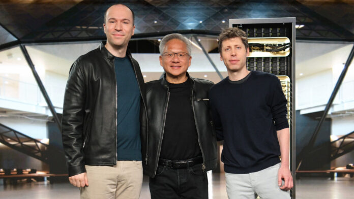 Three unidentified men stand together in front of a large server rack in a modern, angular interior space.