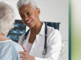 Doctor talking to patient