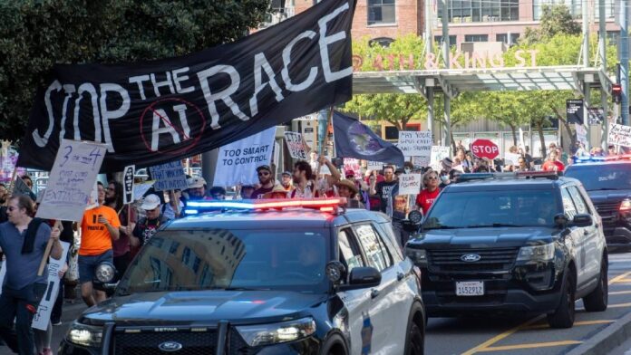 Hundreds of protesters march to OpenAI and Anthropic offices, say they want AI race to stop now