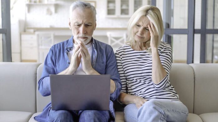 Senior couple on computer