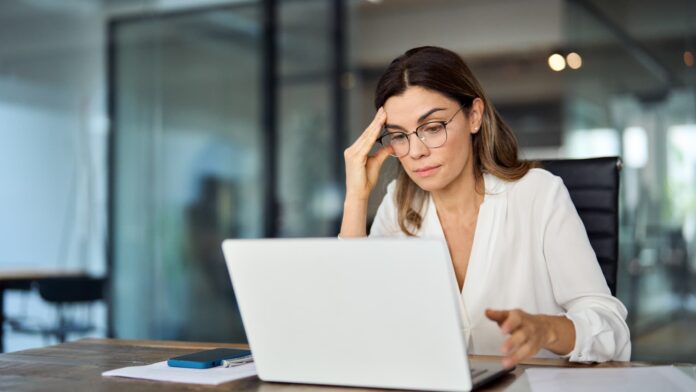 Companies are pushing AI, but experts say it can add extra labor, cause 'brain fry'